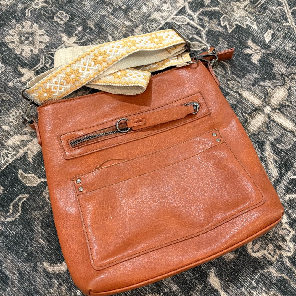 Orange Leather Crossbody Bag with Patterned Strap